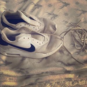 Used white nike shoes
